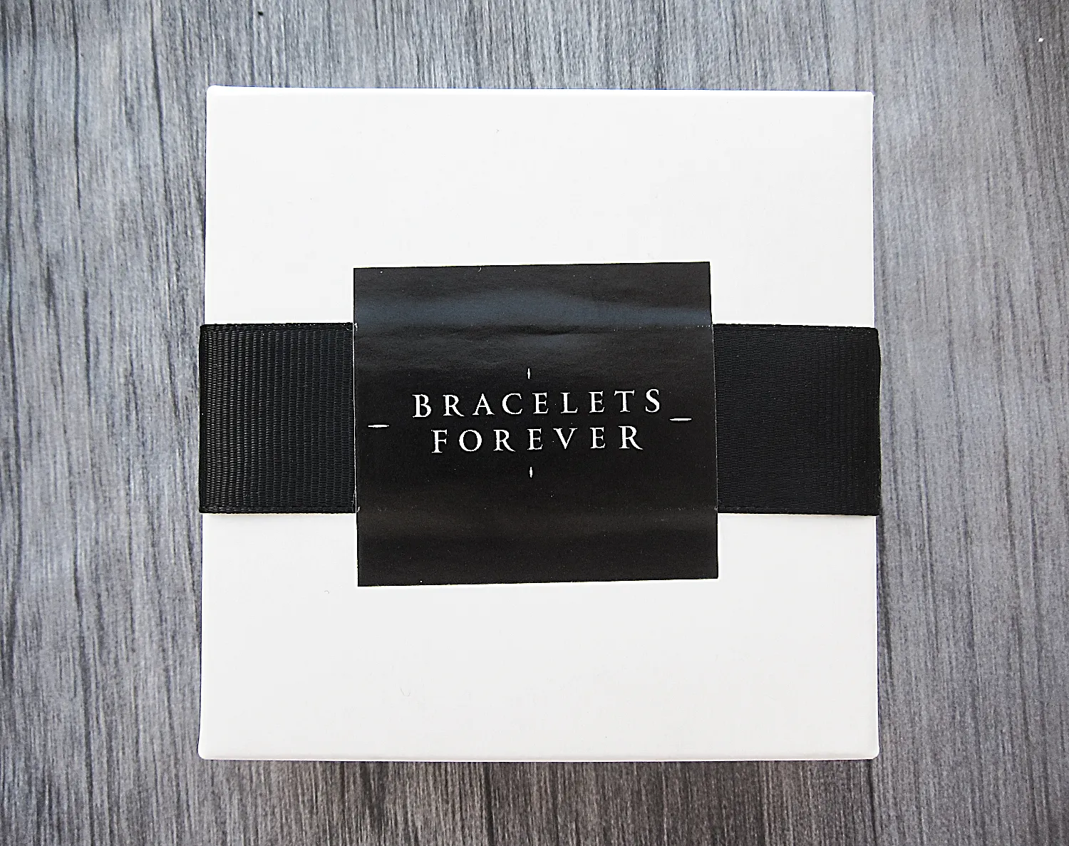 Black Flatbead Men's braided bracelet with hematite and CZ beads